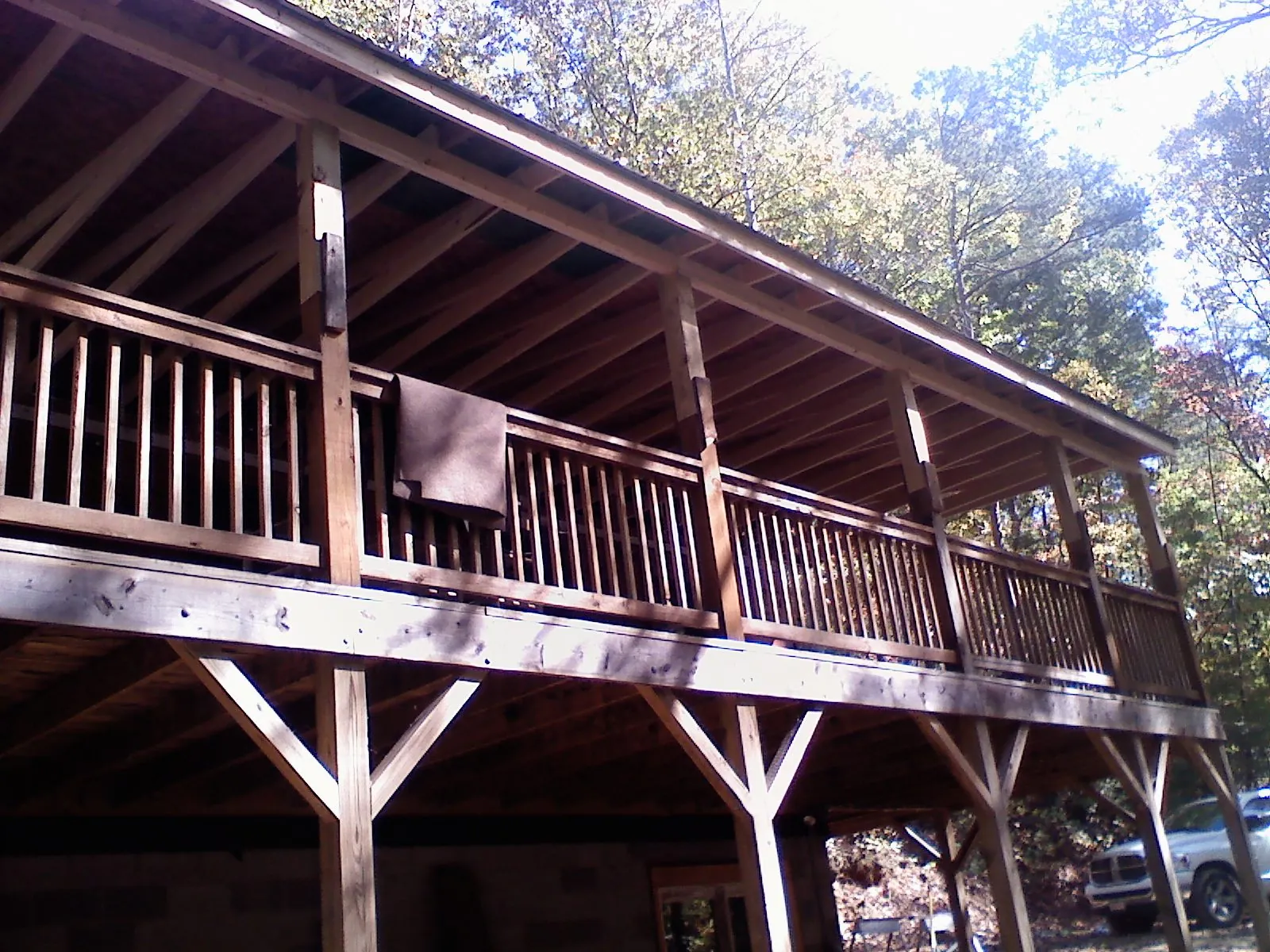 Timber framing under a new elevated porch and deck — Roof Leak Repair in Roscoe by Roofing Brothers